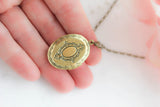 A Pocket of Posies Cameo Photo Locket Necklace
